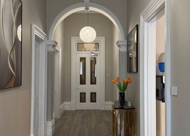 Elegant hallway at Wink Aesthetics Clinic, Melbourne, Victoria, AU with modern decor and soft lighting.