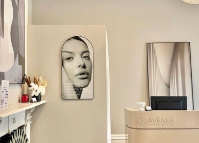 Wink Aesthetics Clinic stylish reception in Melbourne, Victoria, AU featuring art and modern decor.