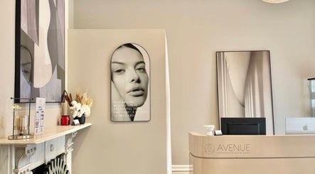 Wink Aesthetics Clinic stylish reception in Melbourne, Victoria, AU featuring art and modern decor.