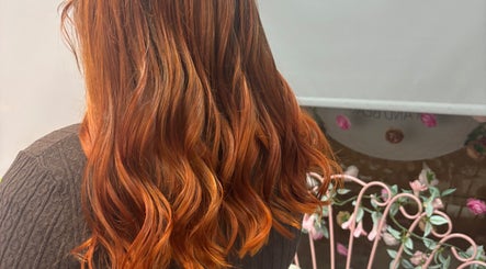 Flowing red hair beautifully styled at Luna Hair, Redditch, England, GB, showcasing vibrant color and expert care.