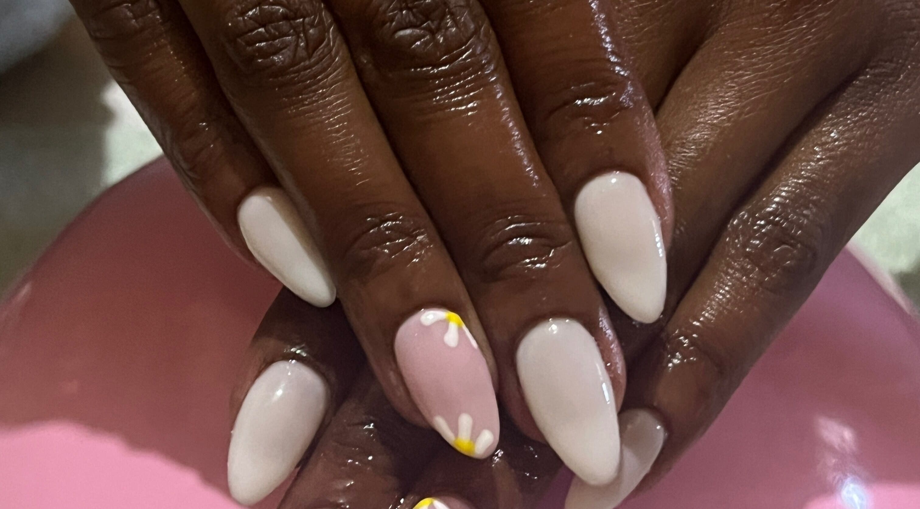 Elegant floral nail art at Nailed_itby_k, Worcester, Western Cape, ZA. Stylish pink and white design.