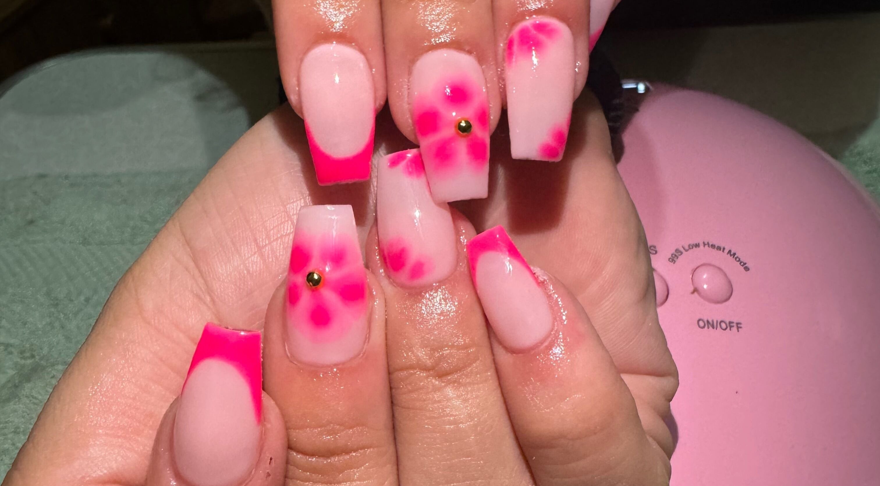 Stylish pink floral nails designed at Nailed_itby_k, Worcester, Western Cape, ZA, showcasing creative nail art.