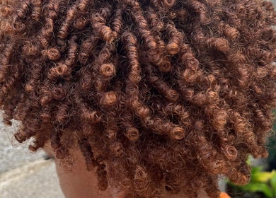 Beautiful curly hairstyle created at Melena Hair Studio, Willemstad, Curaçao, CW.
