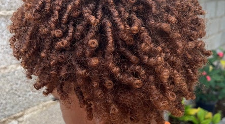 Beautiful curly hairstyle created at Melena Hair Studio, Willemstad, Curaçao, CW.