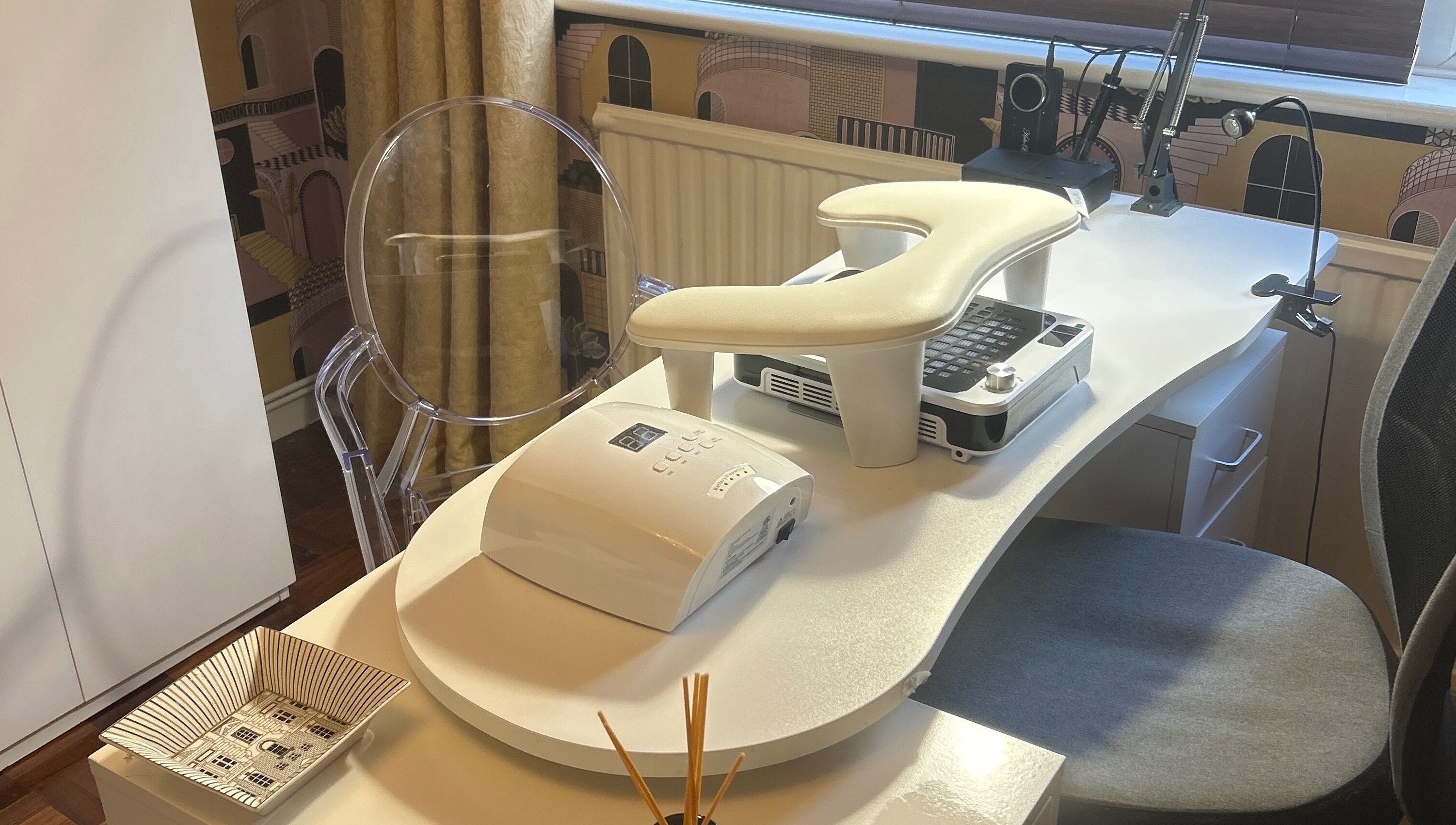 Modern nail station at Nails@32, Laleston, Wales, GB, showcasing sleek design and comfort.