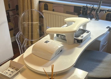 Modern nail station at Nails@32, Laleston, Wales, GB, showcasing sleek design and comfort.