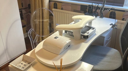 Modern nail station at Nails@32, Laleston, Wales, GB, showcasing sleek design and comfort.