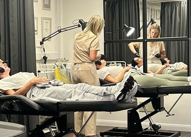 Professional skin treatments at Hydro Clinic, Liverpool, England, GB with two specialists providing care.