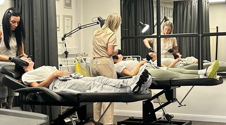 Clients receiving skincare treatments at Hydro Clinic, Liverpool, England. Relaxing ambiance and professional care.
