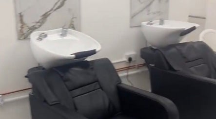 Elegant wash stations at Eunajem Studios, London, England, GB, offering a premium beauty experience.