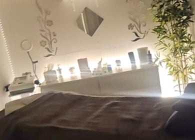 Tranquil treatment room at A Lory Beauty in Dublin, County Dublin, IE, featuring elegant decor and soft lighting.