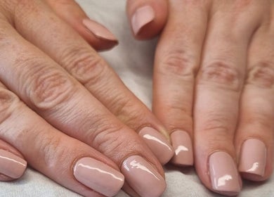 Glossy gel nails from Perfectly Polished Gel Nails in Mauchline, Scotland, GB enhance hand elegance.