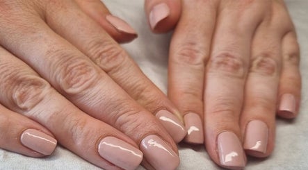Glossy gel nails from Perfectly Polished Gel Nails in Mauchline, Scotland, GB enhance hand elegance.