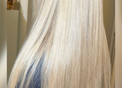 Close-up of silky blonde hair styled at The Glow Lab, Corringham, England, GB.
