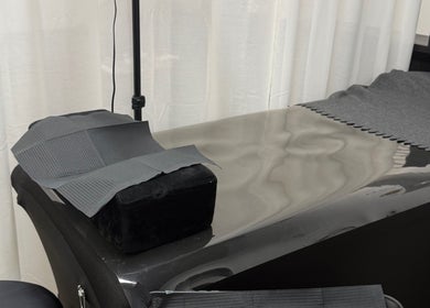 Relaxing treatment table at Glamhaus Beauty in New Westminster, British Columbia, CA, with calming neutral tones.