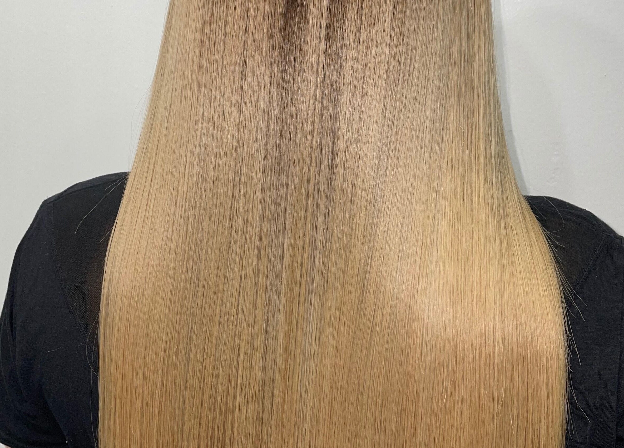 Sleek blonde hair treatment at You.360bda in City Of Hamilton, Pembroke Parish, BM.
