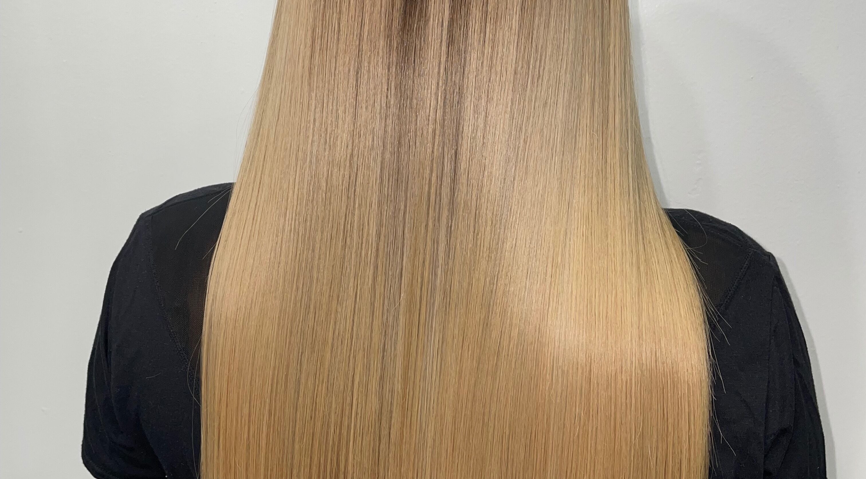 Sleek blonde hair treatment at You.360bda in City Of Hamilton, Pembroke Parish, BM.