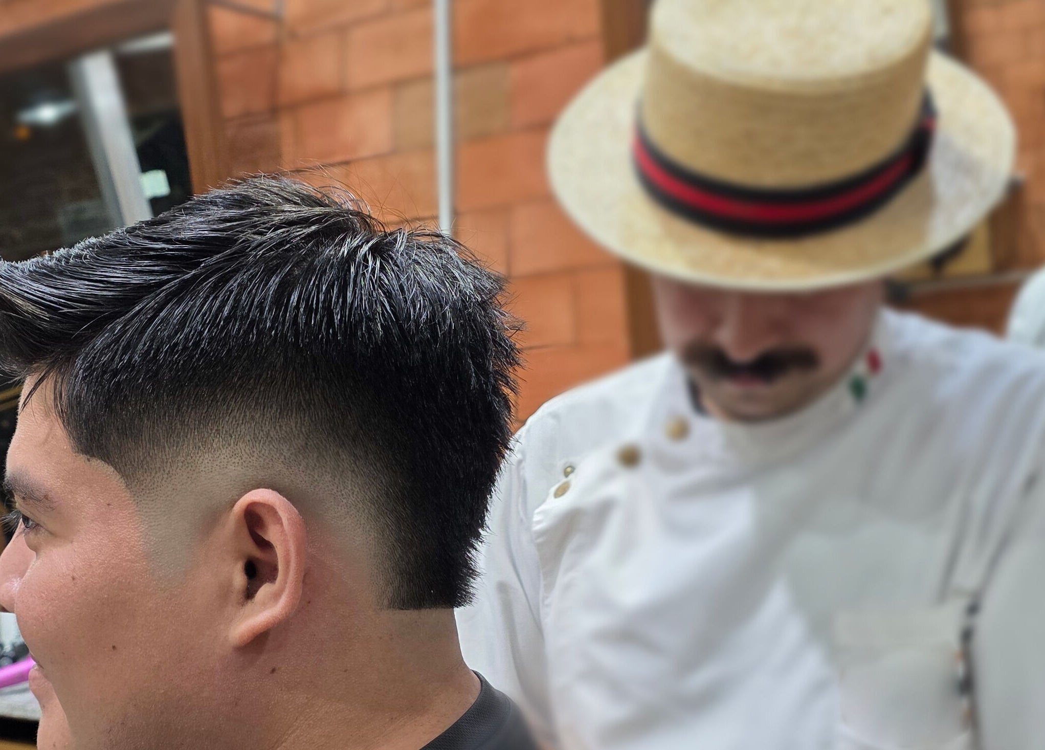 Corte de cabello realizado en Dany Slick Barber Studio, Mérida, Yucatán, MX. Mostrando estilo moderno y profesional.