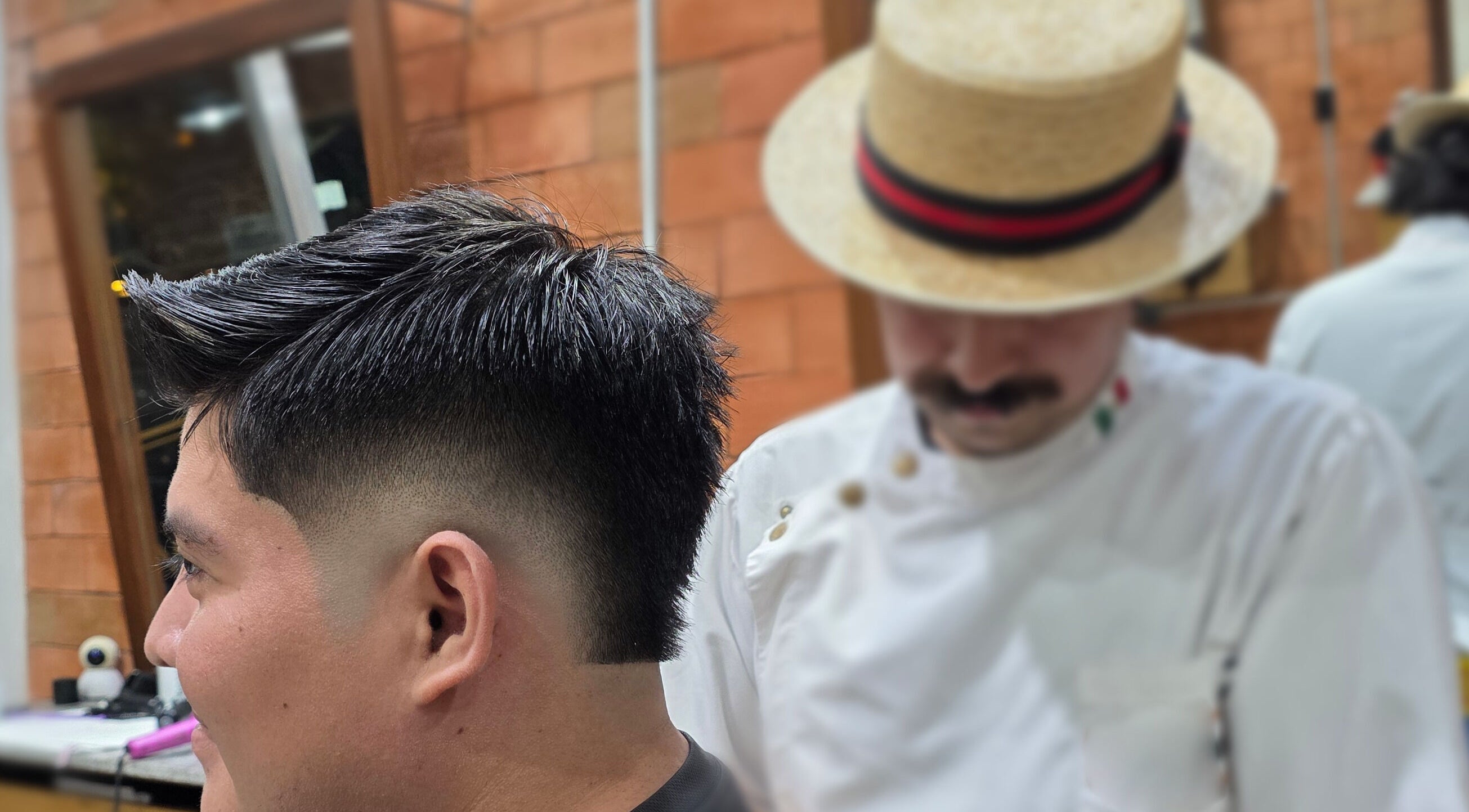 Corte de cabello realizado en Dany Slick Barber Studio, Mérida, Yucatán, MX. Mostrando estilo moderno y profesional.