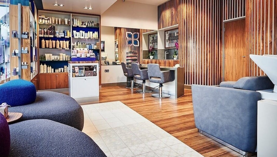 Luxurious salon interior at URBA SOLU LTD, London, England, GB, featuring sleek design and modern seating.