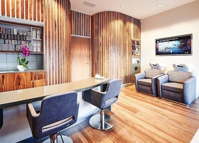 URBA SOLU LTD's stylish waiting area in London, England, GB with sleek design and plush seating.