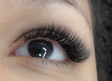 Detailed close-up of expertly applied eyelash extensions at Arty Lash, Spring Hill, Queensland, AU.