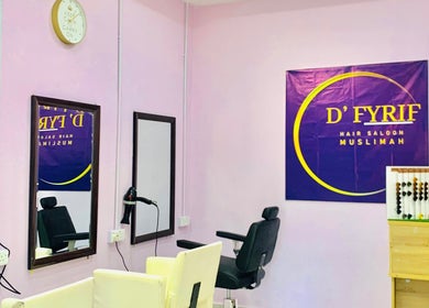 Stylish salon interior at Dfyrifsaloon, Langkawi, MY with mirrors and seating for a relaxing experience.