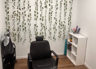 Modern salon chair and decor at Crownculturebraids_, Killeen, Texas, US.