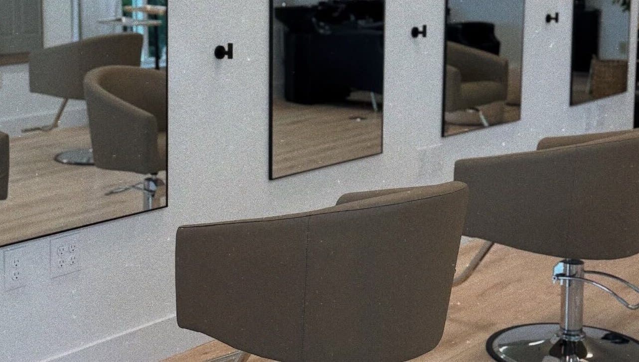 Modern salon chairs and mirrors at Blondes by Lily in Englewood, Florida, US, offer a stylish beauty experience.