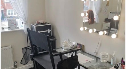Makeup station at Tysbeautysalon, Bridgetown, Saint Michael, BB with lit vanity mirror.