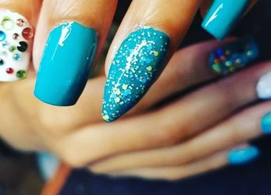 Stunning abstract nails with vibrant colors at Polished Abstract Nails, Grandview, Missouri, US.