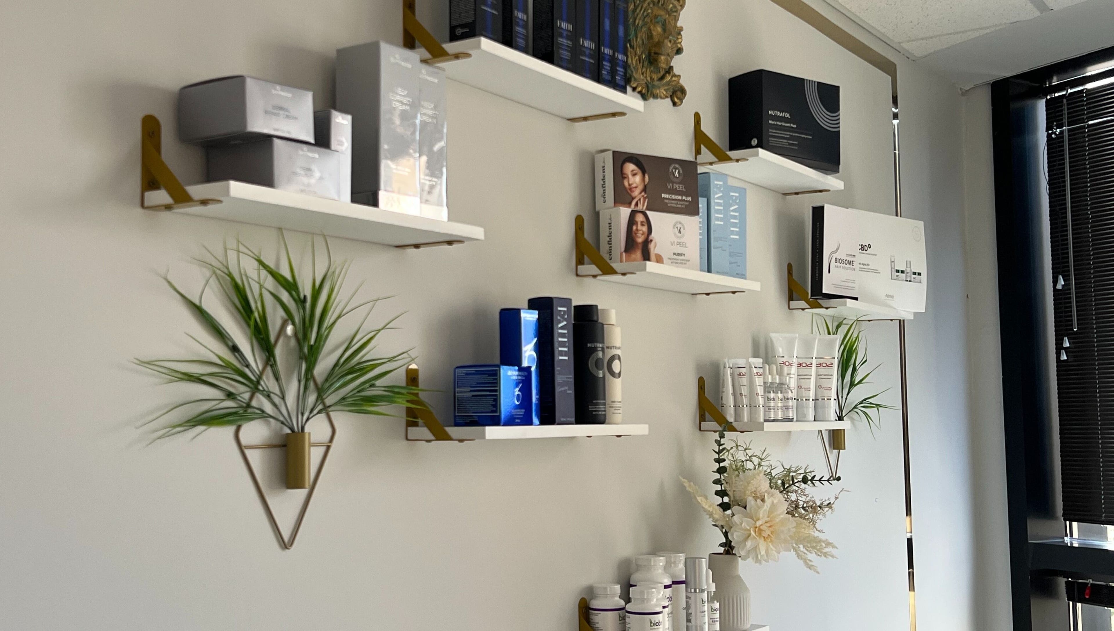 Product shelves at Nova Vue Medical Spa Aesthetics in New York, New York, US showcasing skincare and beauty items.