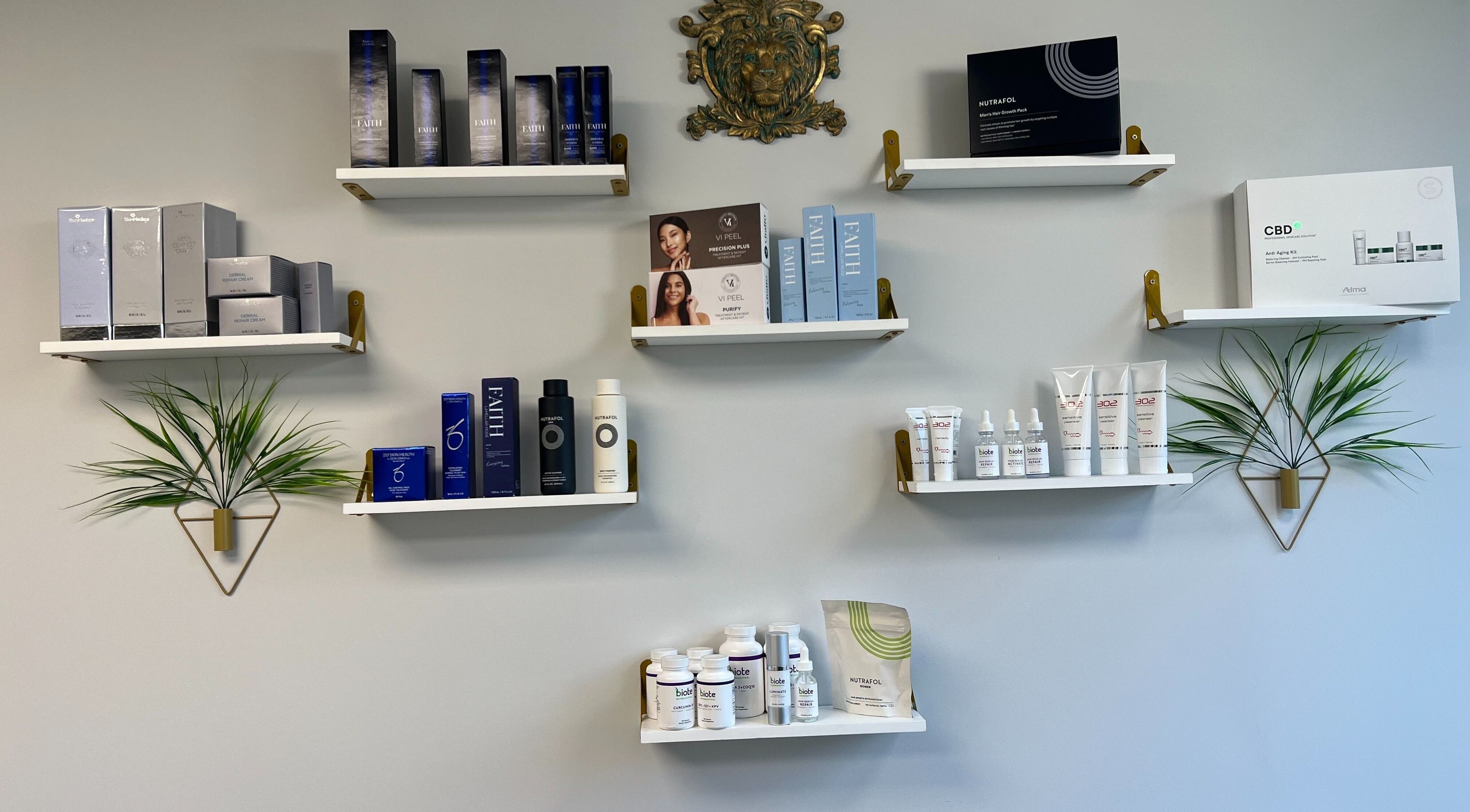 Product display at Nova Vue Medical Spa Aesthetics, New York, featuring skincare on elegant white shelves.