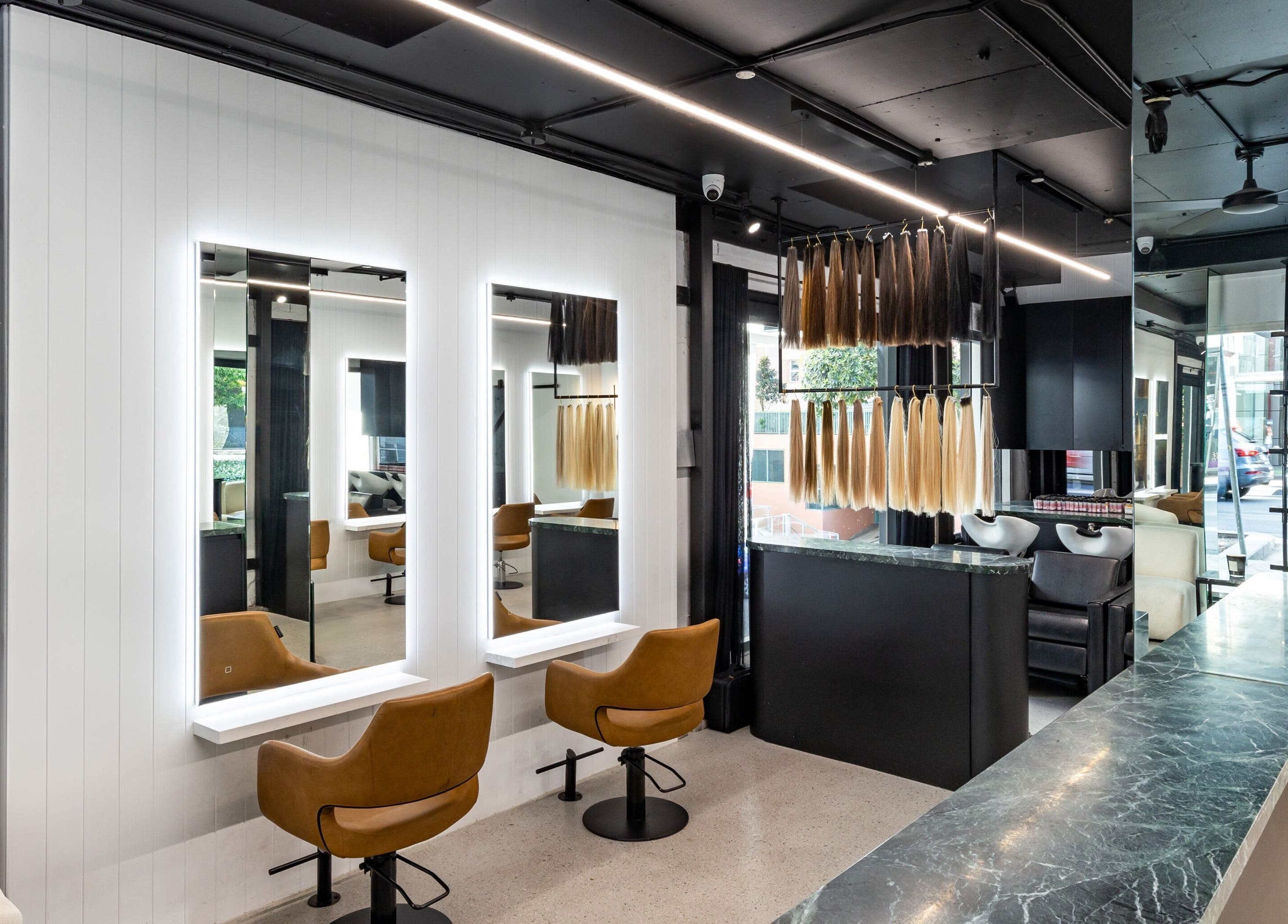 Modern salon interior at MAISON MANE HAIR, Bondi Junction, New South Wales, AU with sleek decor and styling stations.