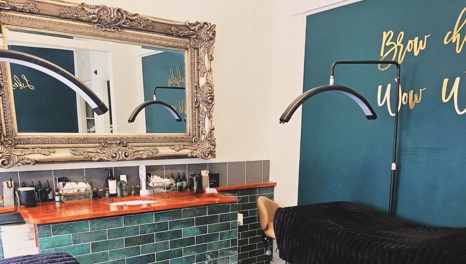 Elegant workspace at Whiplash Xpress in Cronulla, New South Wales, AU with ornate mirror and stylish decor.