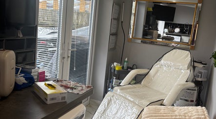 Relaxing treatment room at LSC Beauty & Aesthetics, Cardiff, Wales, GB, featuring a comfortable white chair.