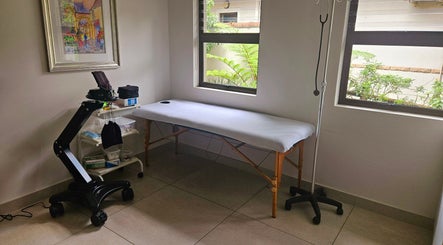 Relaxing treatment room at Island Aesthetics, Cape Town, Western Cape, ZA. Equipped for serene beauty therapy.