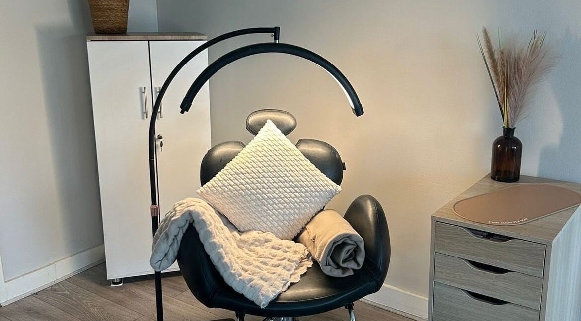 Elegant wellness setting at ByNataliemaria, Bromborough, England with relaxing chair and decor.