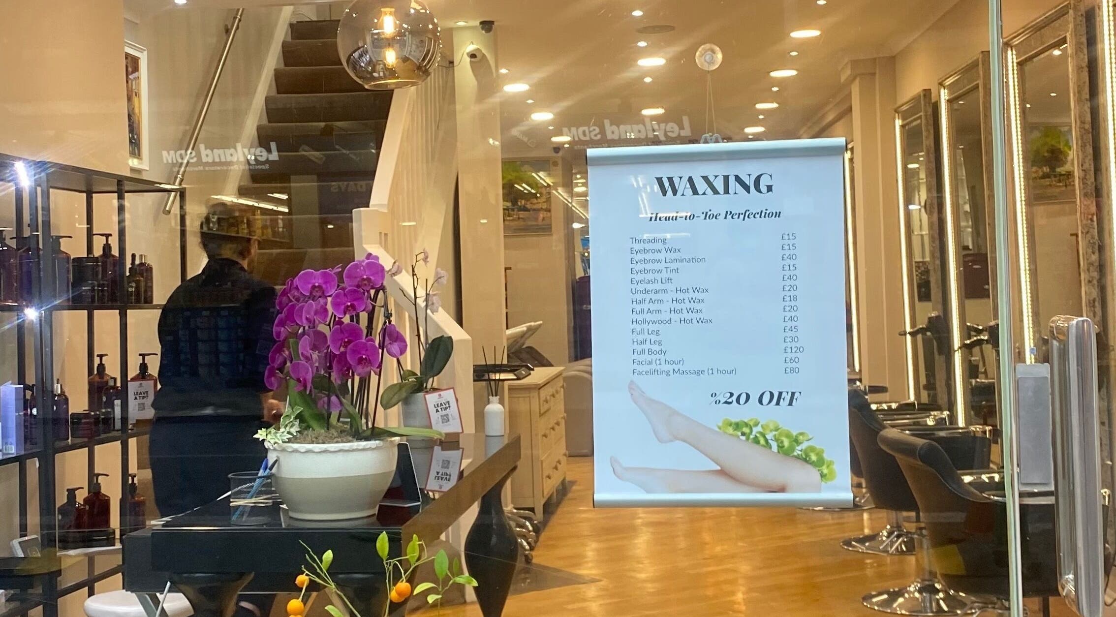 Interior of Aesthehealth Beauty & Medical Cosmetic, London, England, showcasing services and stylish decor.