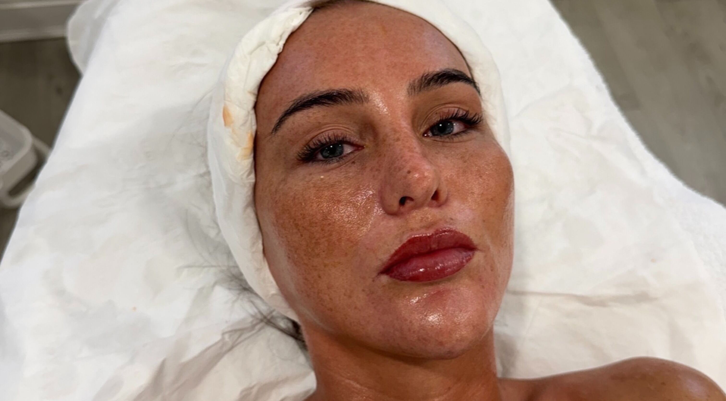 Relaxed individual enjoying a rejuvenating facial at Enhanced ByEl in Leeds, England, GB.