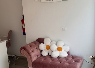 Chic interior with flower cushions at Joana Devesa Glam Studio, Condeixa-a-nova, Coimbra, PT.