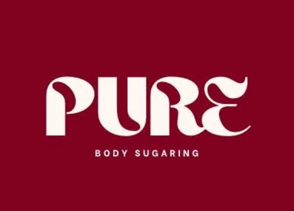 Logo of Pure Body Sugaring in elegant script, located in Willemstad, Curaçao, CW.