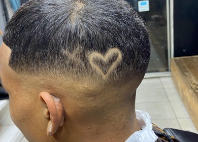 Heart-shaped hair design at Massie’s Barber Shop, Stellenbosch, Western Cape, ZA.