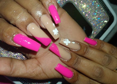 Elegant pink and nude nails with floral design at Nailedbylee, Junction, St. Elizabeth Parish, JM.