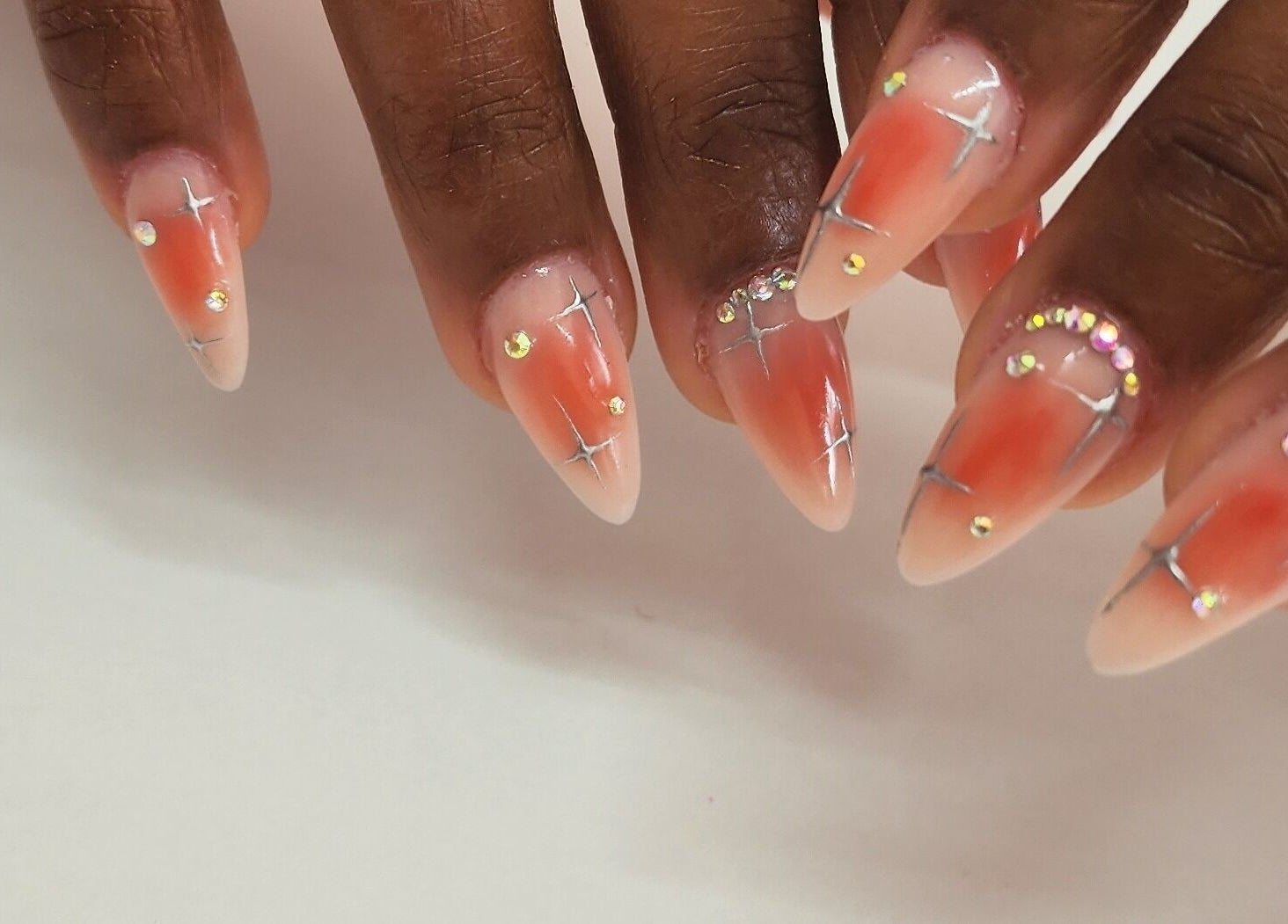 Stylish manicured nails with gem details at Holistic Sculpt & Beauty, Kempton Park, Gauteng, ZA.