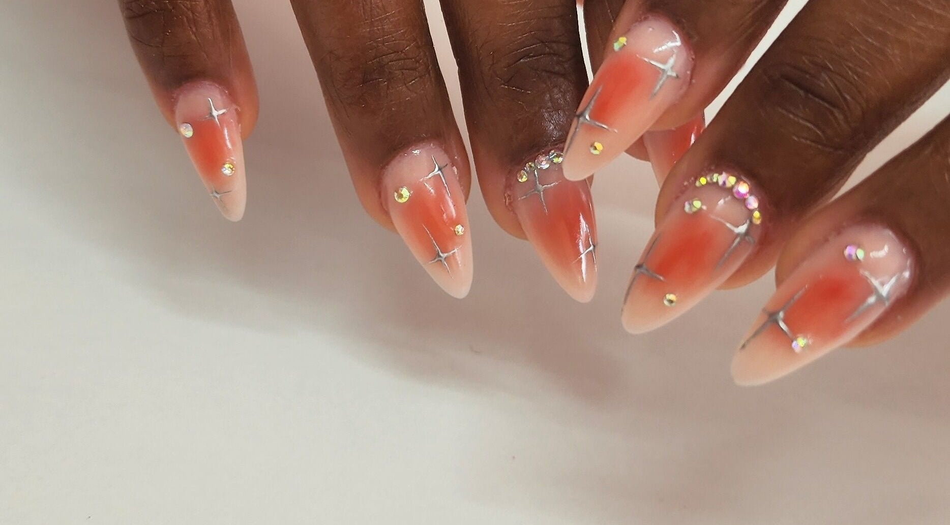 Stylish manicured nails with gem details at Holistic Sculpt & Beauty, Kempton Park, Gauteng, ZA.