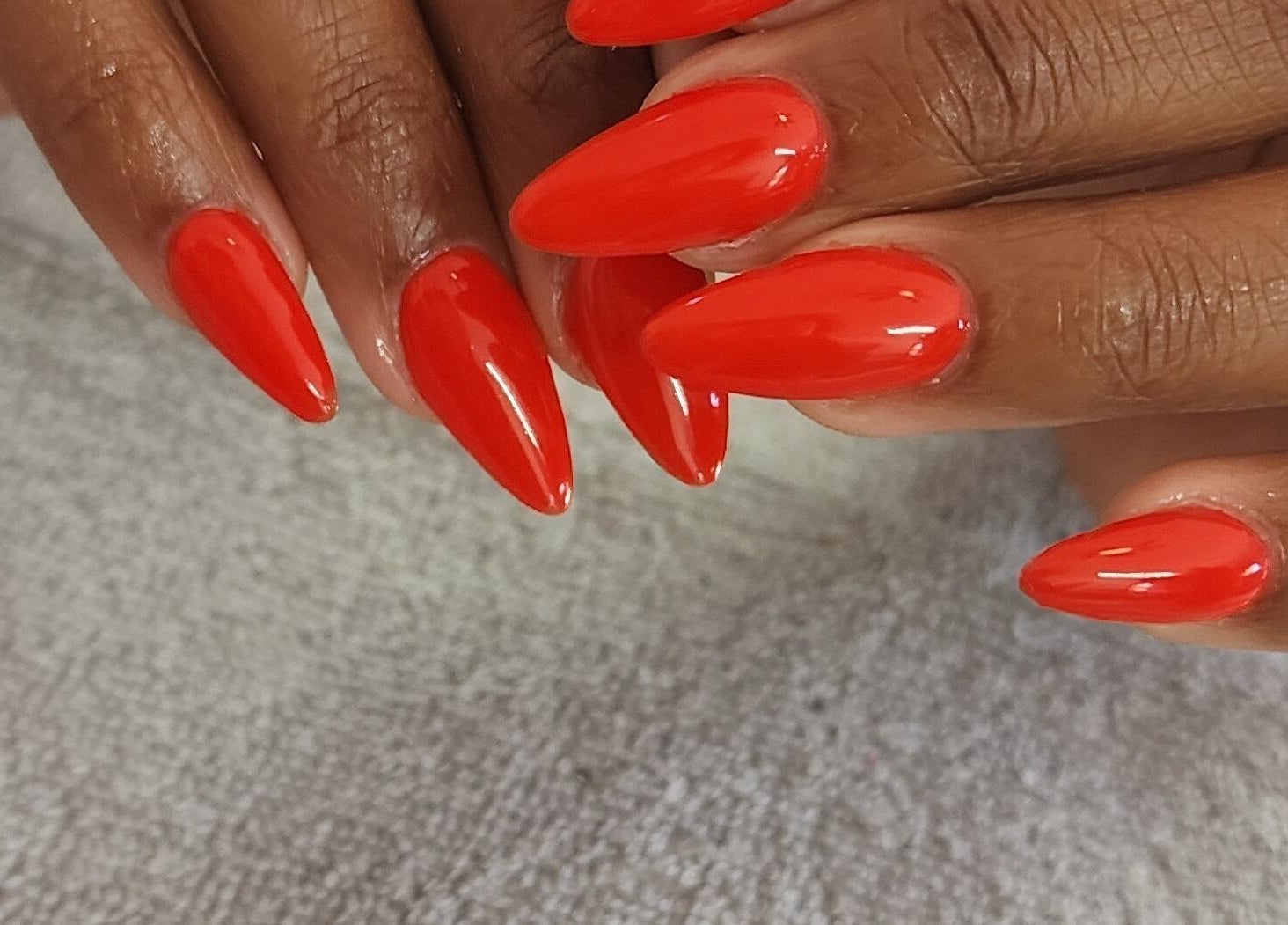 Vibrant red manicure at Holistic Sculpt & Beauty, Kempton Park, Gauteng, ZA.