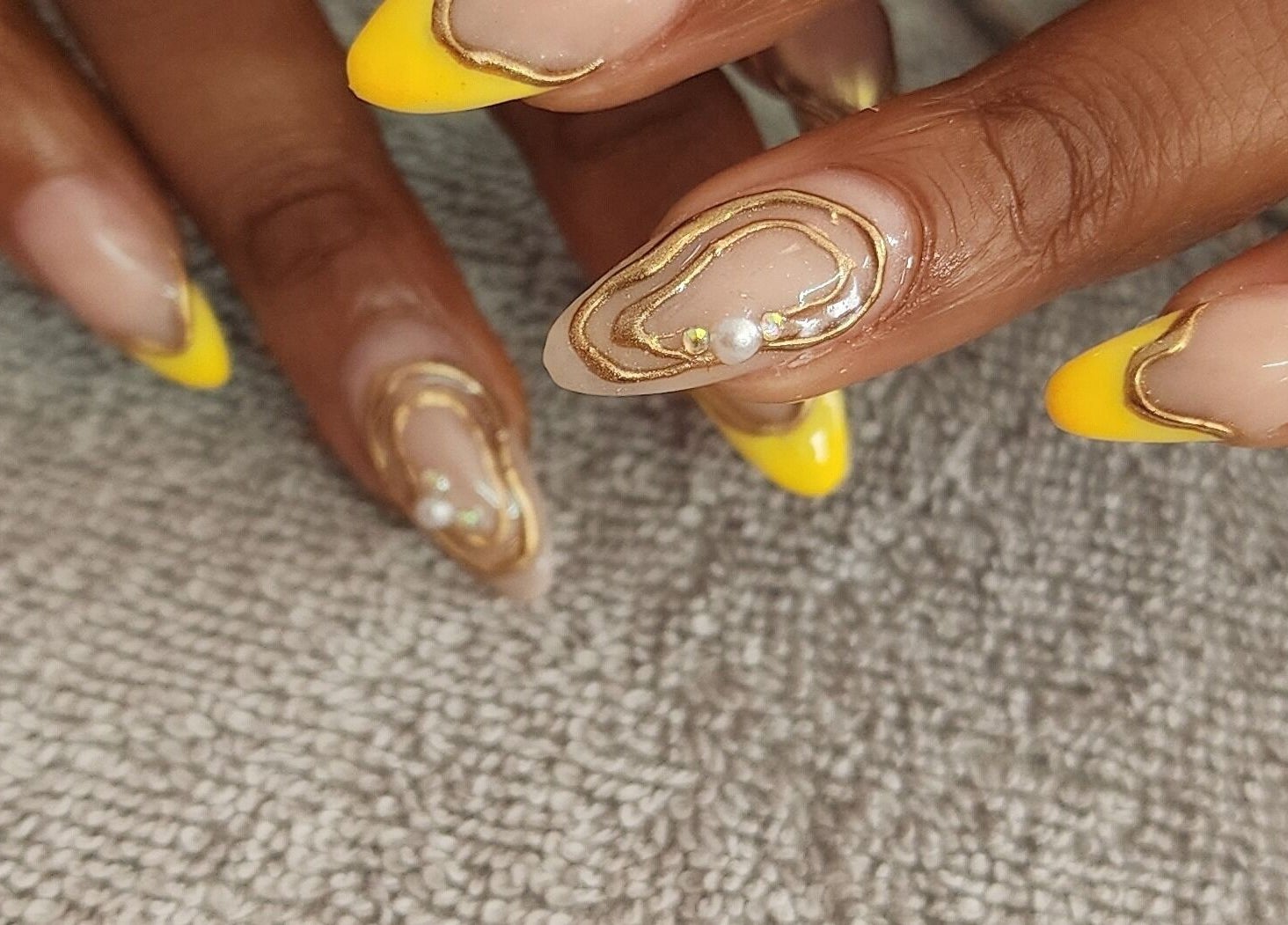 Elegant yellow and pearl nail art at Holistic Sculpt & Beauty, Kempton Park, Gauteng, ZA.