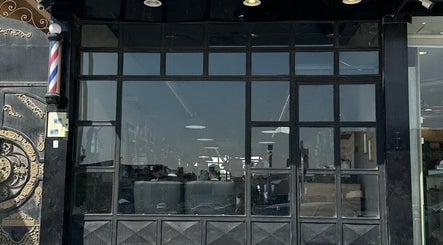 Exterior view of Wakar Al Chaib in Riyadh, Riyadh Province, SA with stylish black and gold details.