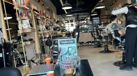 Modern salon interior at Wakar Al Chaib, Riyadh, Riyadh Province, SA, showcasing elegant styling chairs and mirrors.